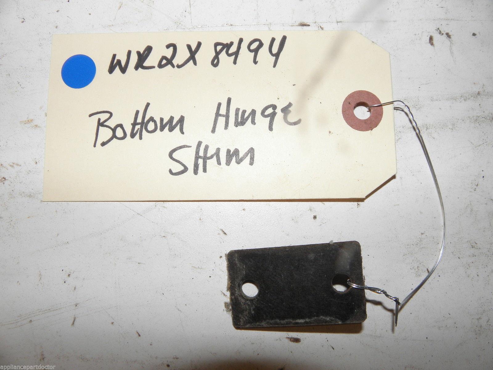 GE REFRIGERATOR WR2X8494 SHIM HINGE BOTTOM USED PART ASSEMBLY GE REFRIGERATOR WR2X8494 SHIM HINGE BOTTOM USED PART ASSEMBLY